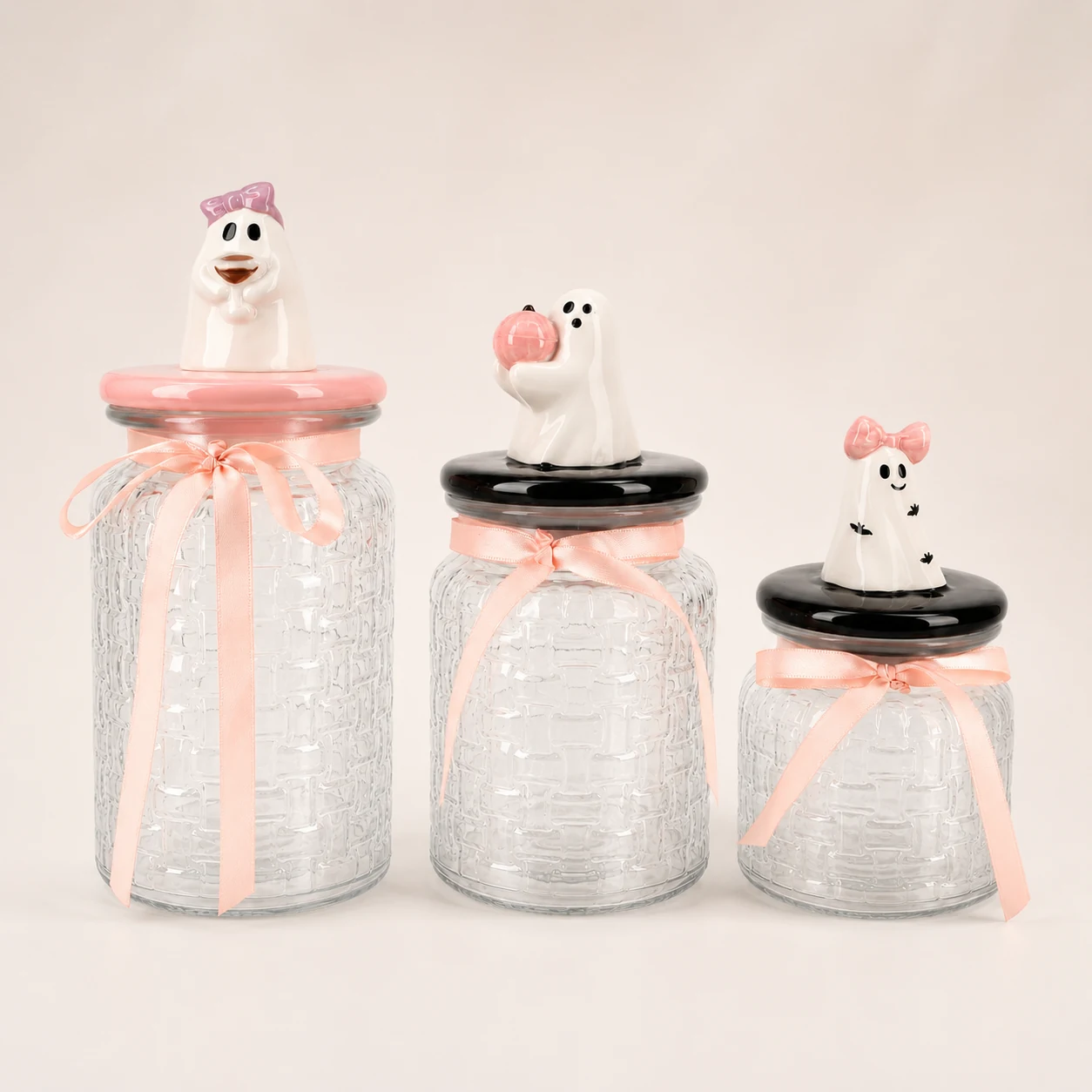 Three pink ghost Halloween glass storage jars