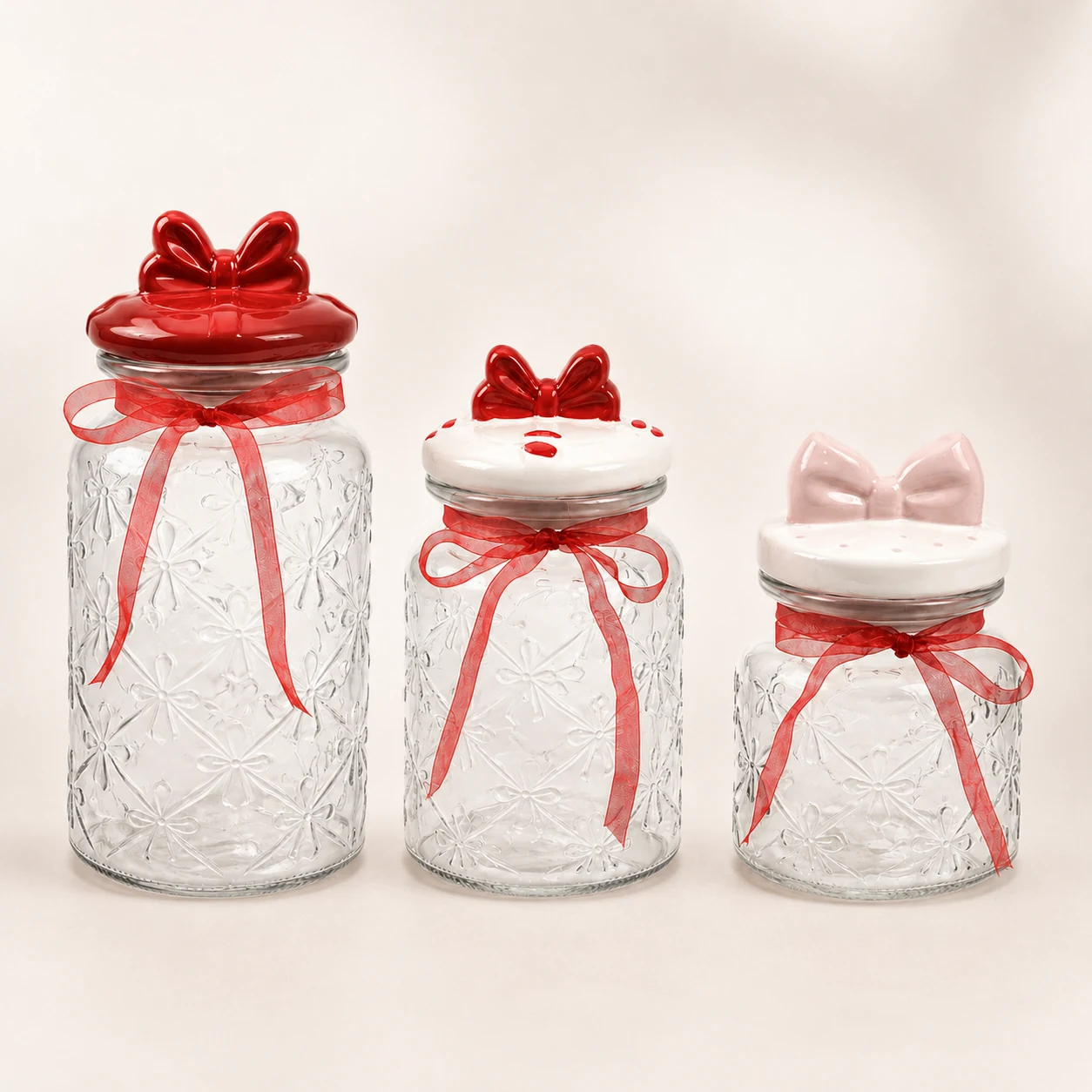 Three red bow Valentine glass storage jars
