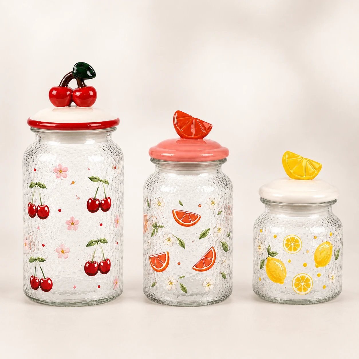 Three cherry orange and lemon Easter glass storage jars